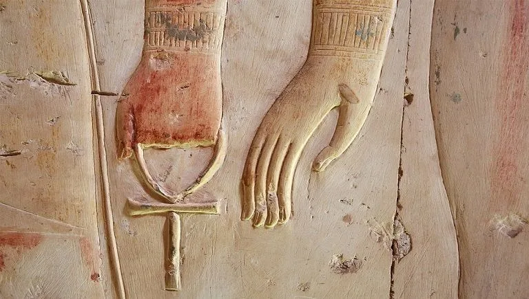 Hand holding the Ankh symbol, or Egyptian cross