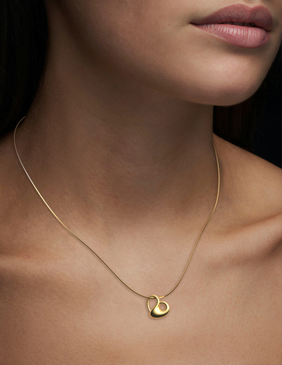Designer Jewellery – open heart necklace in gold by FLOA Design UK – on neck