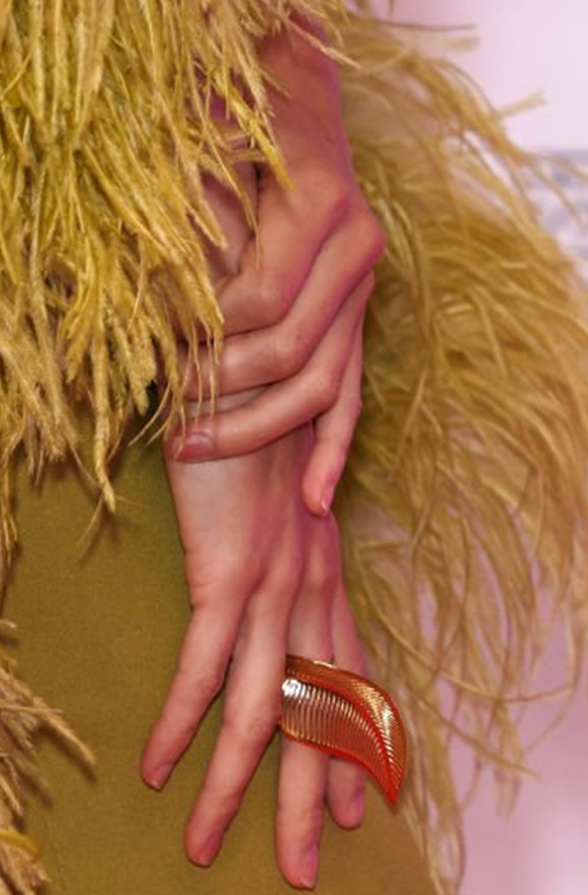 Close-up of Pixie Lott’s hand wearing the elegant gold Leaf Ring by Floa Design at the British LGBT Awards