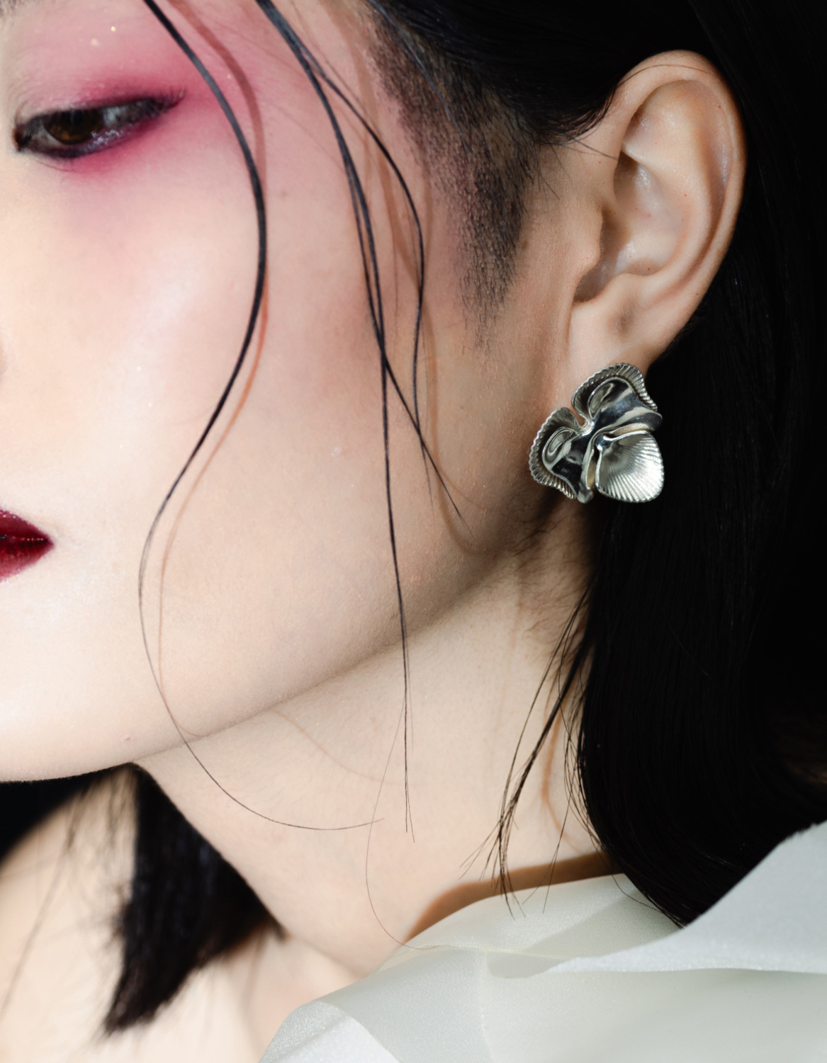 Orchid earrings – sculptural silver orchid flower stud earrings by Floa Design