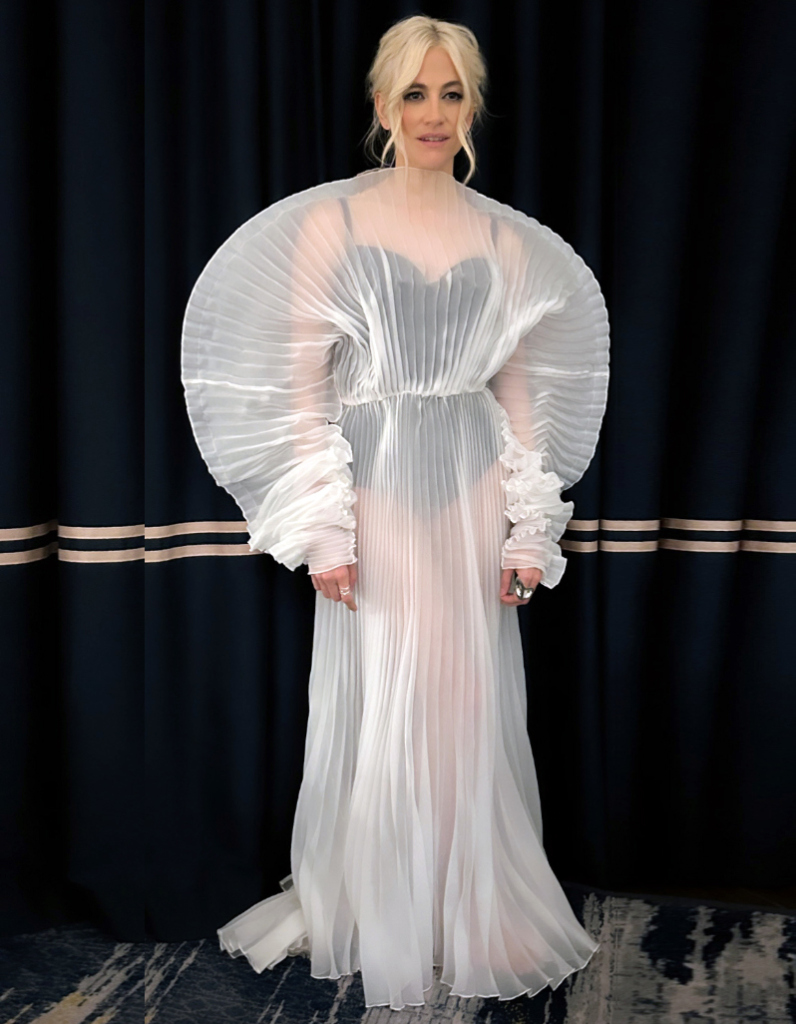 British music celebrity Pixie Lott wearing limited edition contemporary silver rings by Floa Design with a sculptural pleated dress at the Women's Football Awards in London